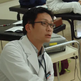 紀平晃功氏